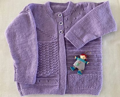 Mauve Cardigan knitted in multi pattern with buttons down the front for ages 5-6 years