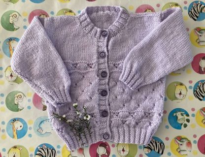 Hand knitted lilac cardigan with a lace pattern and 6 buttons