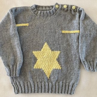 Hand knitted grey jumper with a yellow star knitted motive in front Round neck Yellow buttons on one shoulder Long sleeves Ribbing around neckline, cuffs and hem