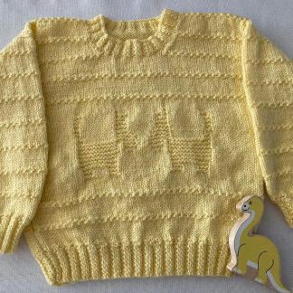 Hand knitted yellow jumper a delightful Scotties pattern Round-neck Buttons on one shoulder