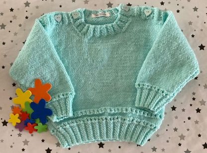 Mint green patterned jumper with for ages 6-12 months