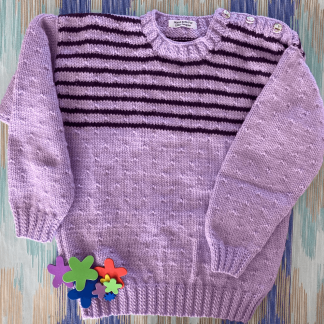 Mauve coloured jumper with purple stripes and a seed pattern