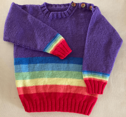 Stunning jumper in colours of the rainbow ages 3-4 years