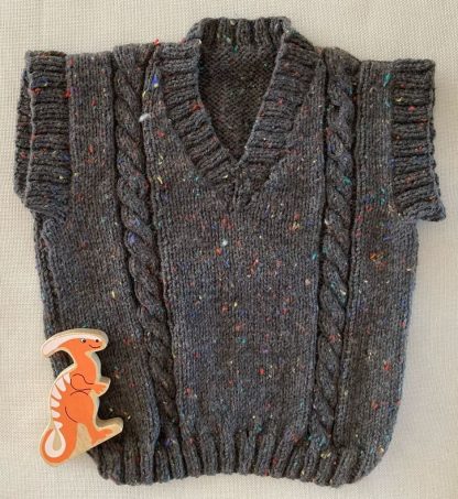 Hand knitted charcoal jumper flecked to give it a tweed effect V- neck Ribbing around neckline, armhole and hem Lovely softwool blended yarn 91% Acrylic, 5% Wool, 5% Viscose