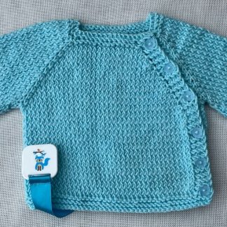 Beautiful hand knitted blue jacket with 6 pretty flower buttons down the side of the jacket. Square neck Long Sleeves Garter stitch around neckline, cuffs and hem. Beautiful soft 100% Acrylic yarn that feels like Cashmere