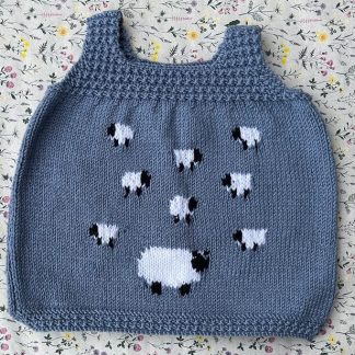 Grey coloured dress with sheep motives for ages 12-18 months Available on order in sizes and colours of your choice