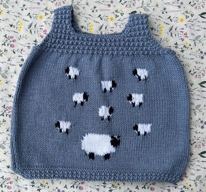 Grey coloured dress with sheep motives for ages 12-18 months Available on order in sizes and colours of your choice