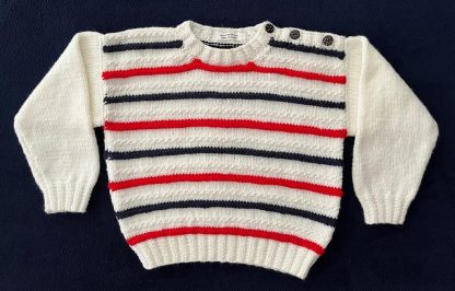 White patterned jumper with blue and red striping contrast for ages 3-4 years For boys and girls Available on order in sizes and colours of your choice